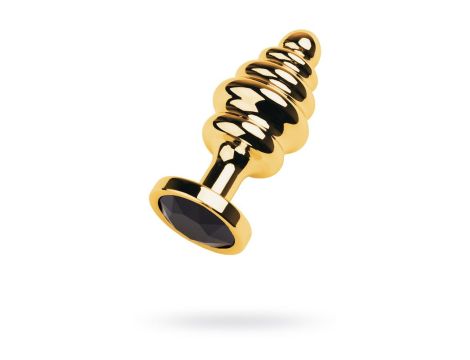 Golden anal plug with  black gem